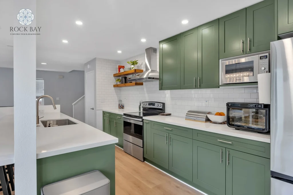 Kitchen home renovation green cabinets countertop