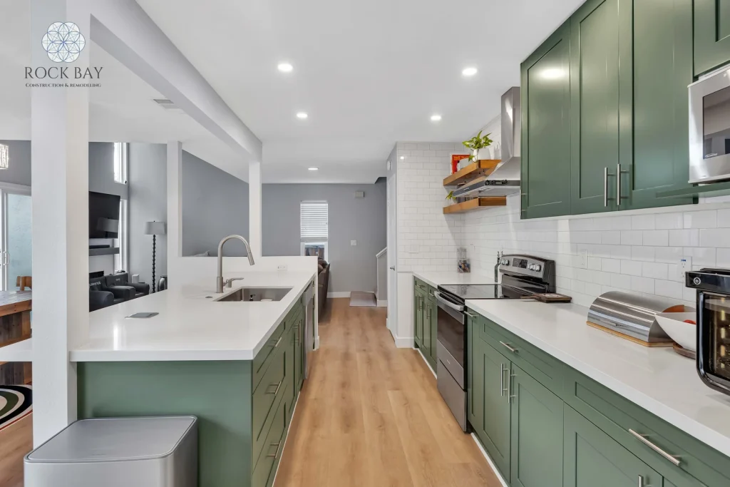Kitchen home renovation subway tile green cabinets